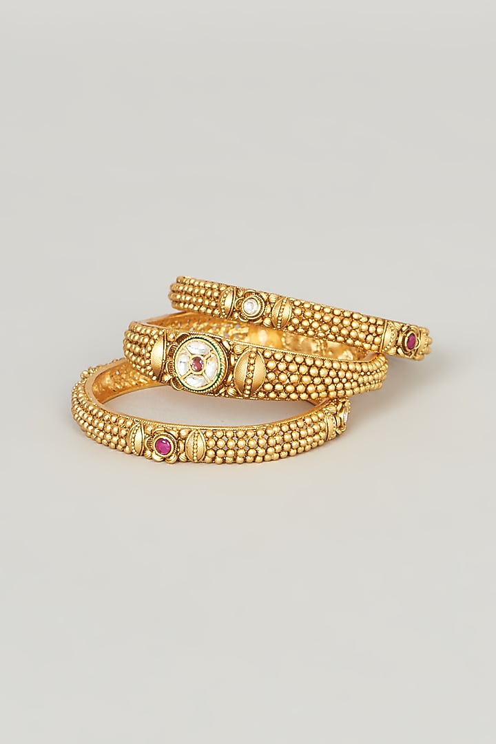 Gold Finish Red Stone Bangle (Set of 3) by Anjali Jain Jewellery at Pernia's Pop Up Shop