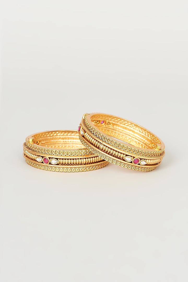 Gold Finish Textured Bangles (Set of 2) by Anjali Jain Jewellery