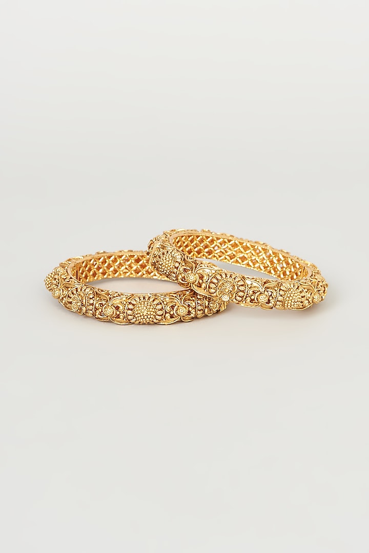 Gold Finish Carved Bangles (Set of 2) by Anjali Jain Jewellery at Pernia's Pop Up Shop