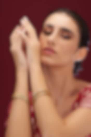 Gold Plated Carved Temple Bangles (Set Of 4) by Anjali Jain Jewellery at Pernia's Pop Up Shop