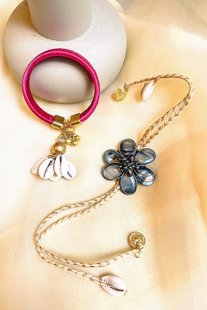Pink Floral Rakhi & Lumba (Set of 2) by Anjali Jain Jewellery at Pernia's Pop Up Shop