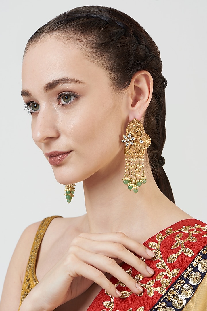 Gold Finish Carved Kundan Polki Dangler Earrings by Anjali Jain Jewellery at Pernia's Pop Up Shop