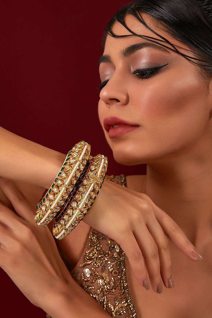 Gold Plated Kundan Polki & Green Stone Bracelet (Set Of 2) by Anjali Jain Jewellery at Pernia's Pop Up Shop