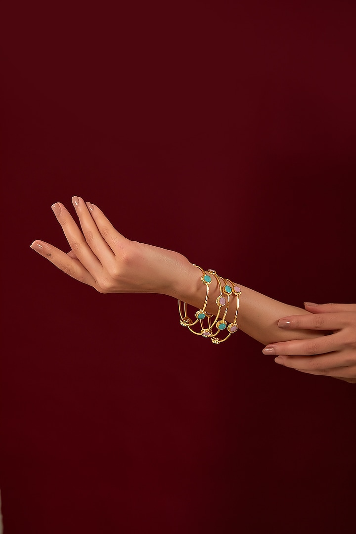 Gold Plated Blue & Pink Agate Bangles (Set Of 4) by Anjali Jain Jewellery at Pernia's Pop Up Shop