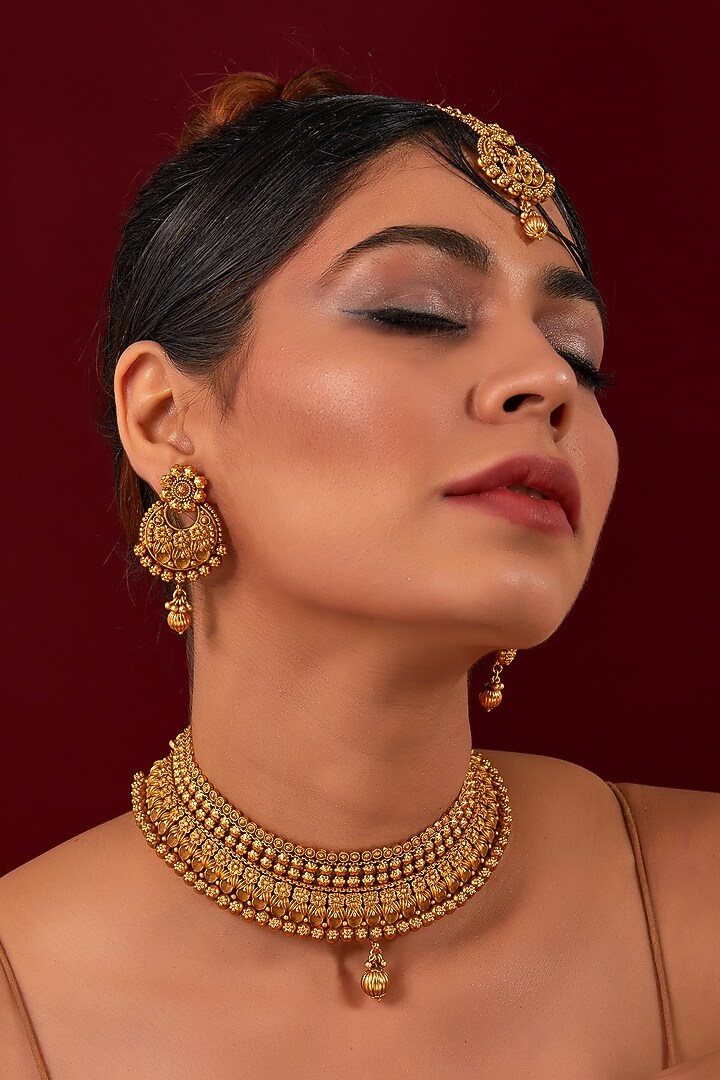 Gold Plated Carved Temple Necklace Set by Anjali Jain Jewellery at Pernia's Pop Up Shop