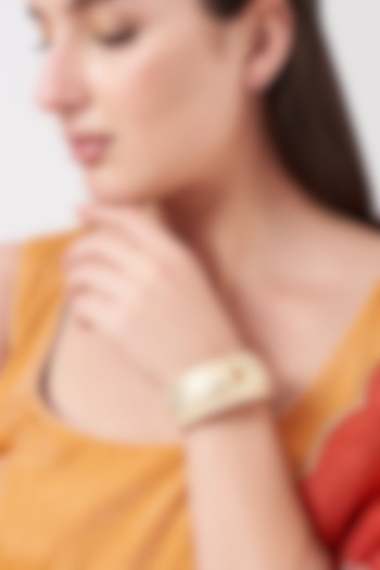 Gold Finish Carved Kundan Polki Bangle by Anjali Jain Jewellery at Pernia's Pop Up Shop