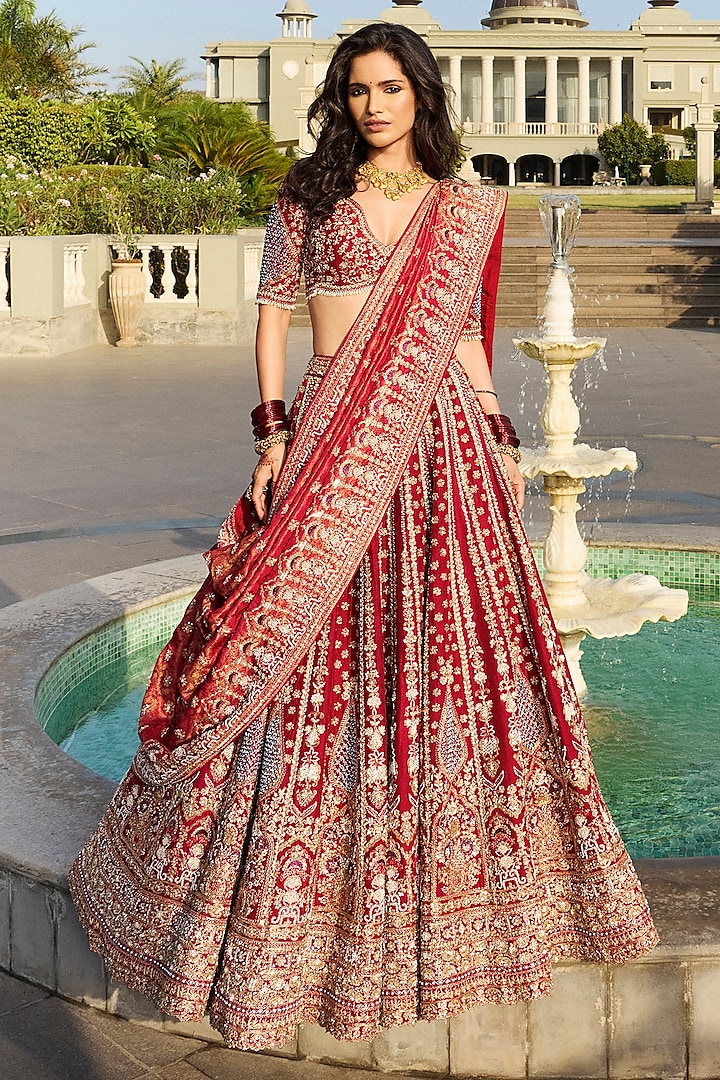 Maroon Red Dola Silk & Banarasi Tissue Zardosi Embroidered Bridal Lehenga Set by ANNU'S CREATION at Pernia's Pop Up Shop