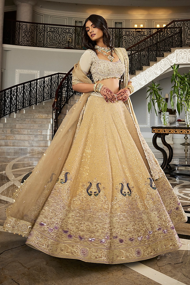 Golden Foil & Tissue Pearl Embroidered Bridal Lehenga Set by ANNU'S CREATION at Pernia's Pop Up Shop