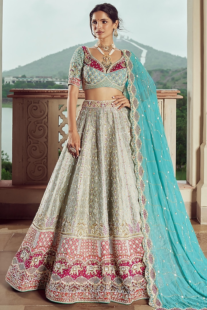 Cold Turquoise Silk & Organza Hand Embroidered Shaded Bridal Lehenga Set  by ANNU'S CREATION at Pernia's Pop Up Shop