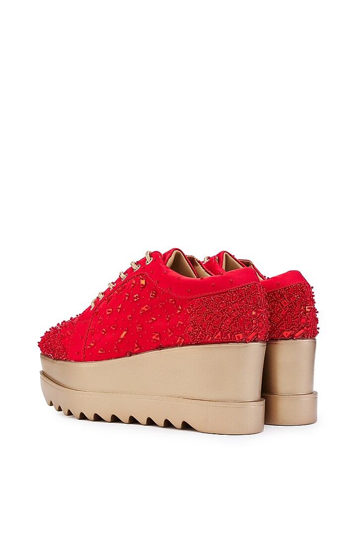 Red Satin Cutdana Hand Embroidered Wedge Sneakers by Anaar at Pernia's Pop Up Shop