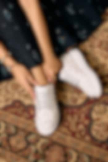 White Faux Leather Sneakers by Anaar at Pernia's Pop Up Shop