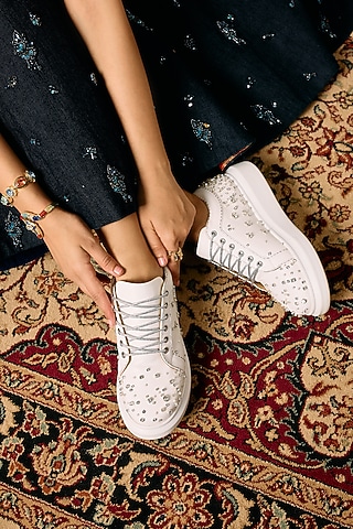 White Faux Leather Sneakers by Anaar