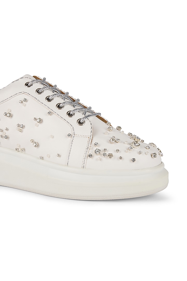 White Faux Leather Sneakers by Anaar at Pernia's Pop Up Shop