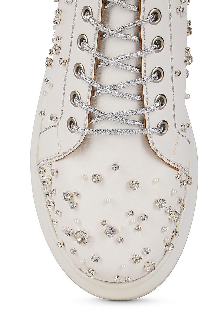 White Faux Leather Sneakers by Anaar at Pernia's Pop Up Shop