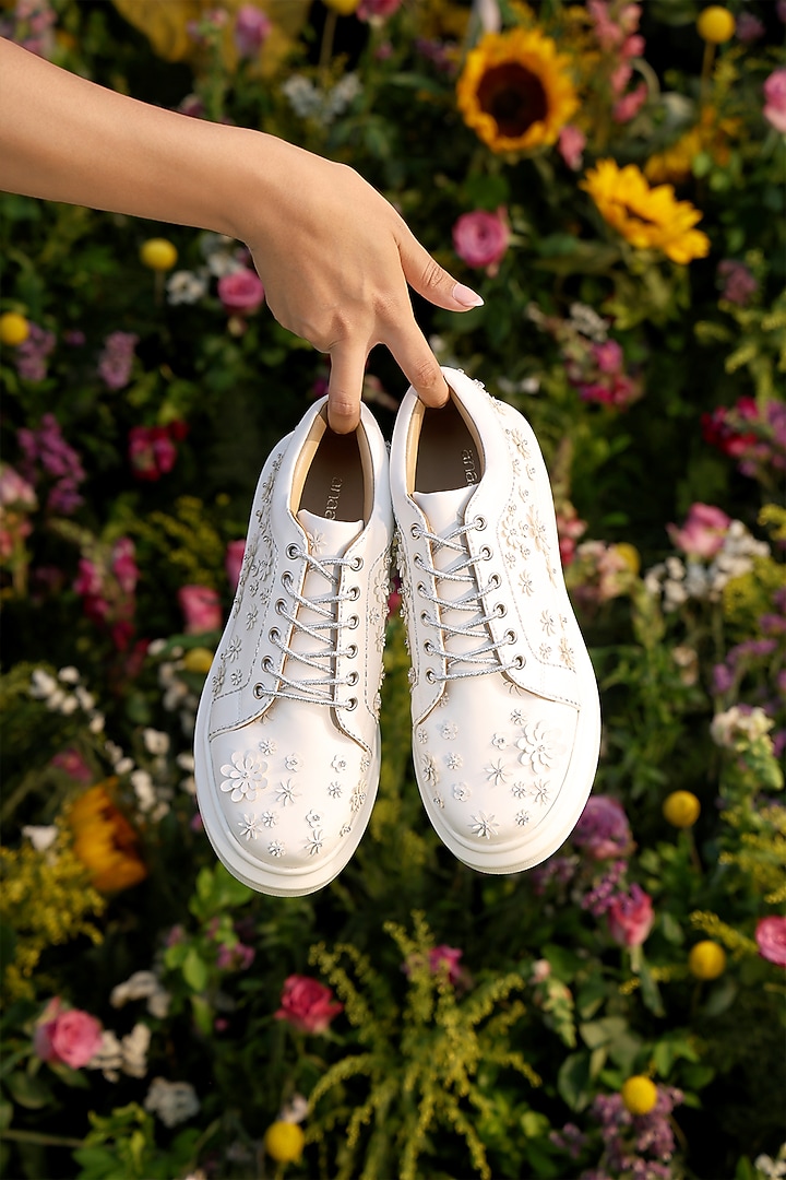 White Faux Leather Sneakers by Anaar at Pernia's Pop Up Shop