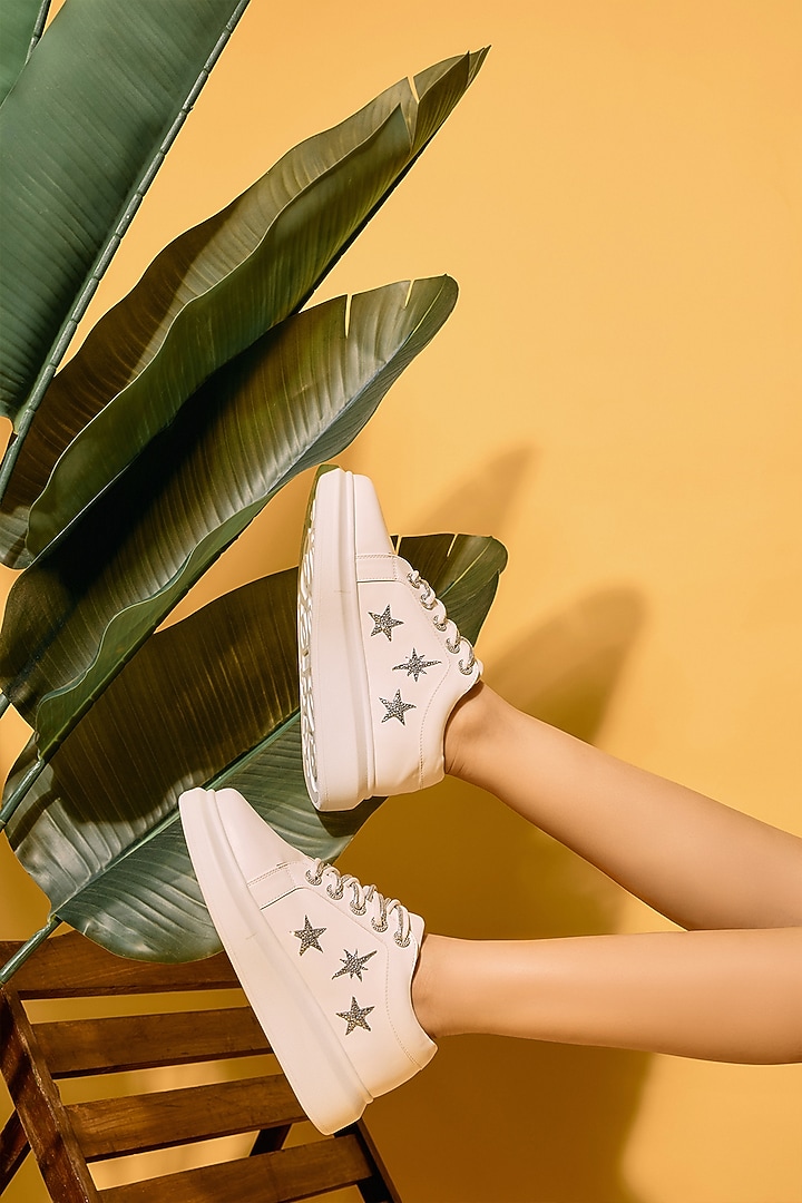 White Faux Leather Sneakers by Anaar at Pernia's Pop Up Shop