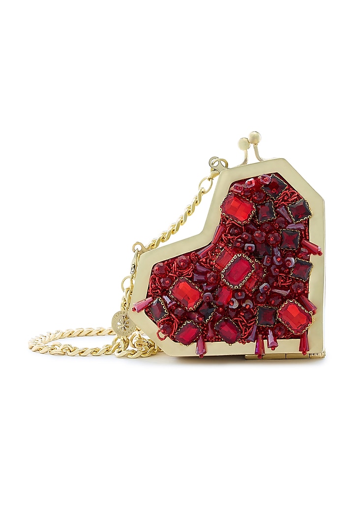 Red Metallic Ruby Stone Embellished Heart Clutch by Anaar at Pernia's Pop Up Shop