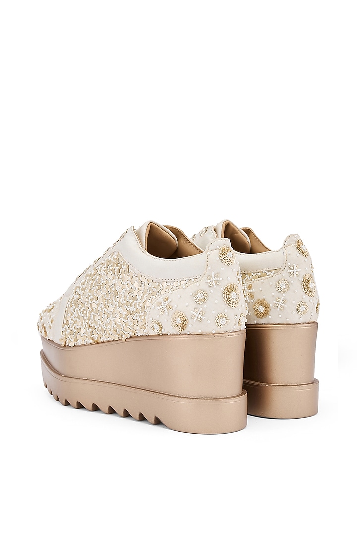Ivory Foiled Milano Satin Zardosi Embroidered Wedge Sneakers by Anaar at Pernia's Pop Up Shop