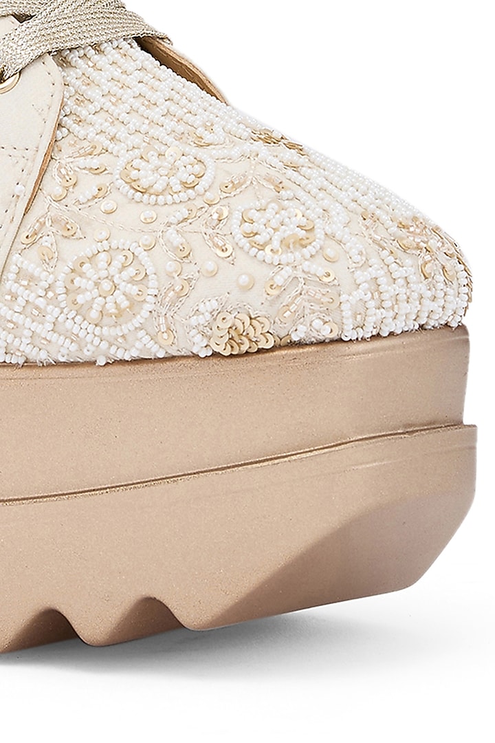 White Foiled Milano Satin & Georgette Resham Hand Embroidered Wedge Sneakers by Anaar at Pernia's Pop Up Shop