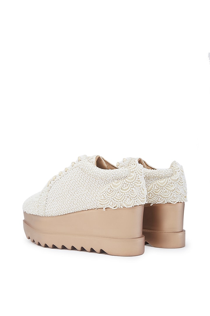 White Foiled Milano Satin Sequins Hand Embroidered Wedge Sneakers by Anaar at Pernia's Pop Up Shop