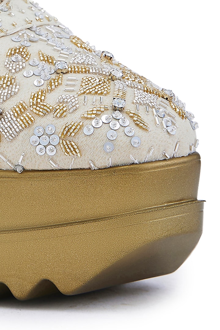 Off-White Striped Chiffon Cutdana Embellished Wedge Sneakers by Anaar at Pernia's Pop Up Shop