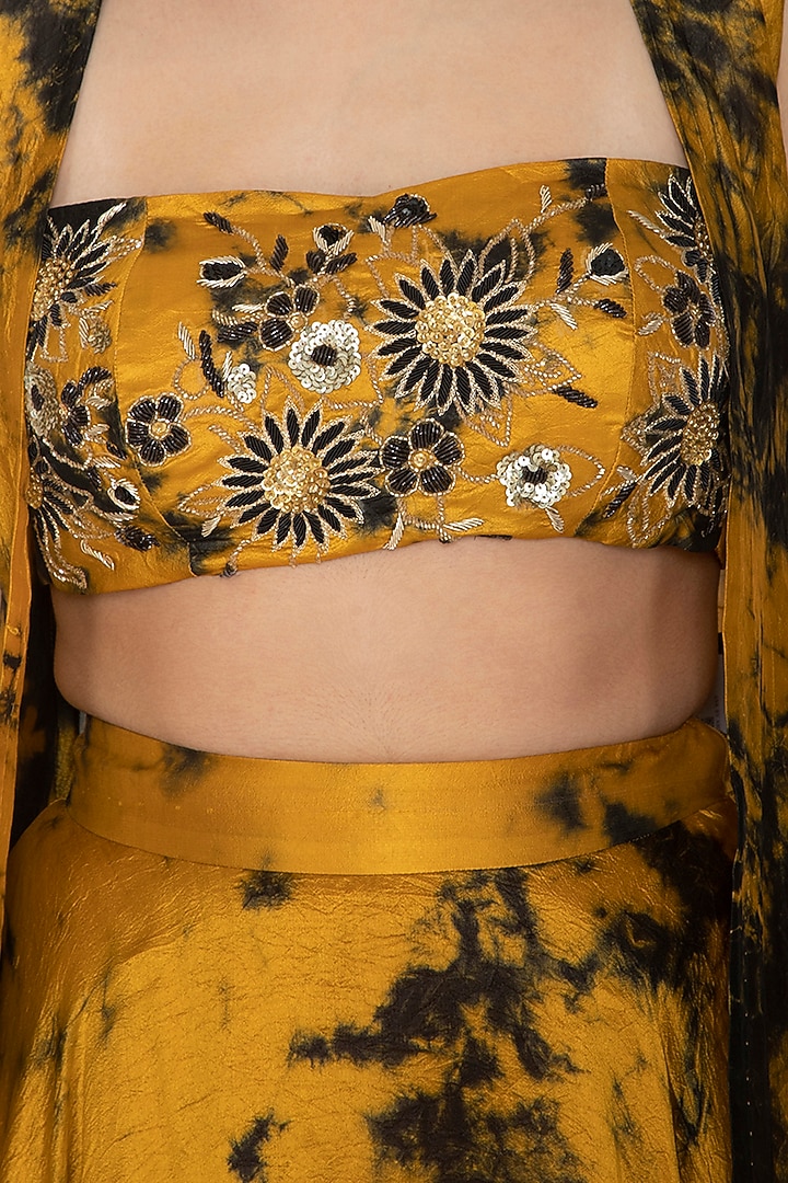 Mustard & Black Embroidered Tie-Dye Cape Wedding Lehenga Set by Ank By Amrit Kaur at Pernia's Pop Up Shop