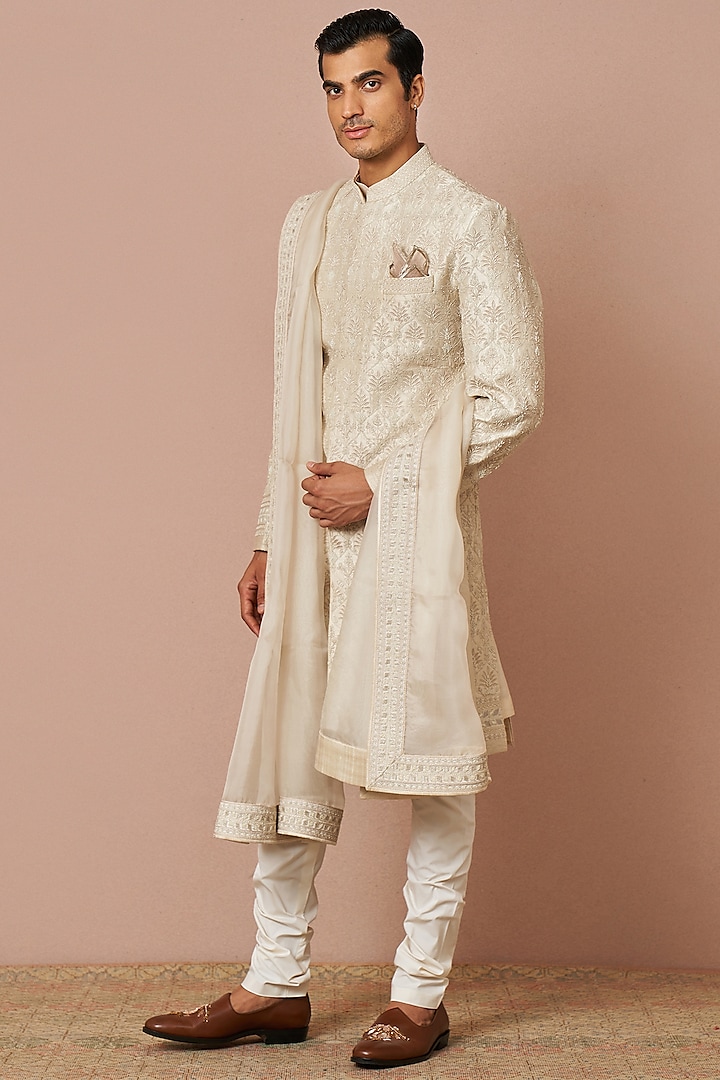 Ivory Raw Silk Embroidered Sherwani Set by Anushree Reddy Men