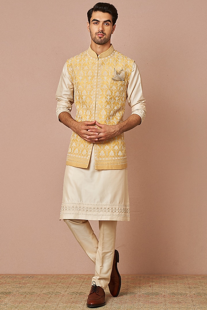 Pastel Yellow Raw Silk Embroidered Bundi Jacket With Kurta Set by Anushree Reddy Men