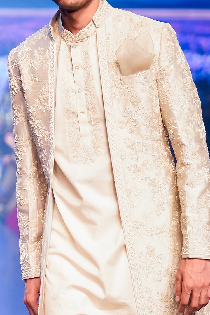 Ivory Raw Silk Groom Indowestern Set by Anushree Reddy Men at Pernia's Pop Up Shop