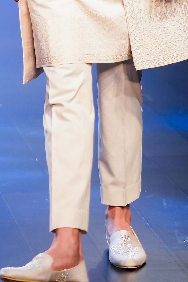 Ivory Raw Silk Groom Indowestern Set by Anushree Reddy Men at Pernia's Pop Up Shop