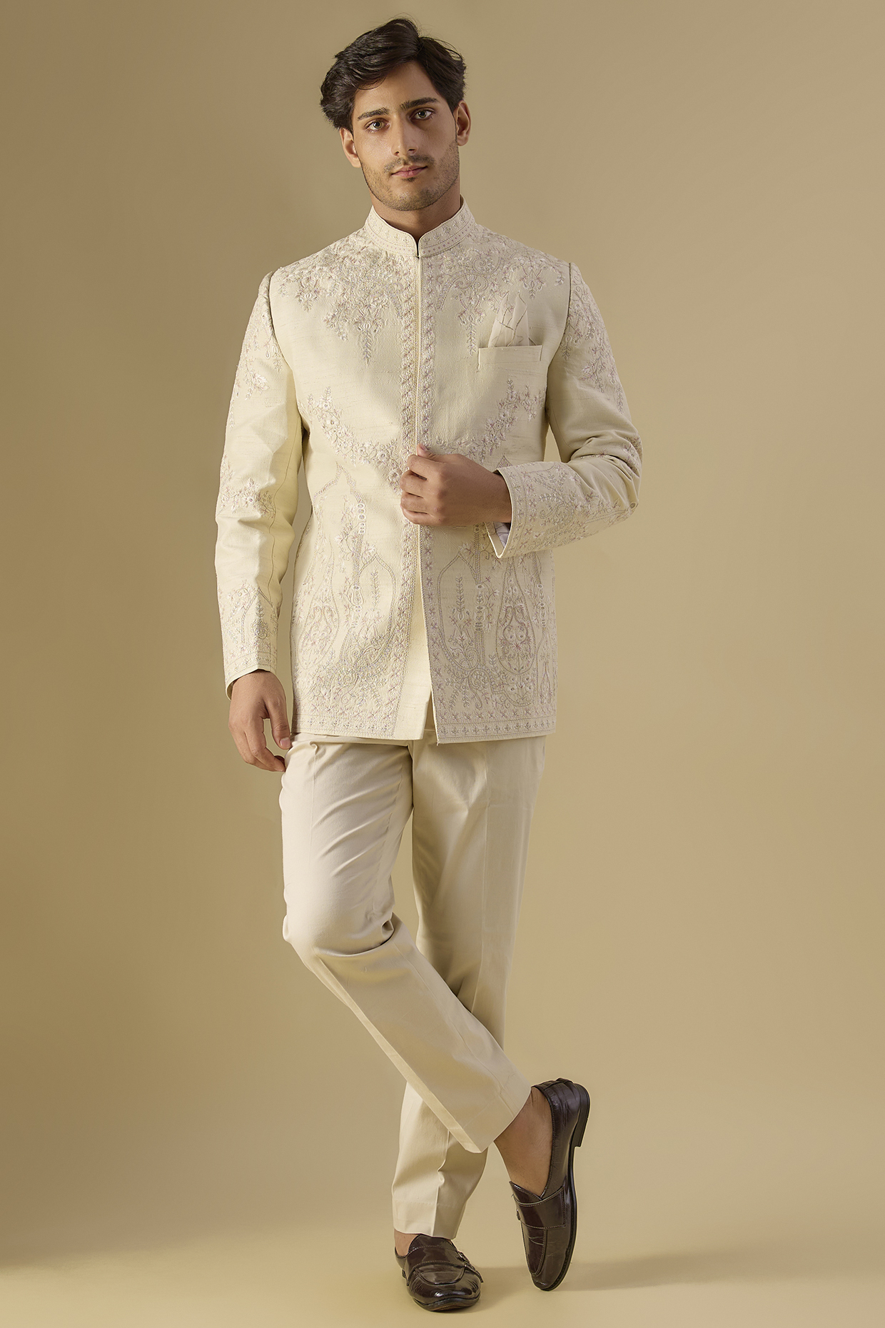 Ivory Raw Silk Embroidered Bandhgala Set by Anushree Reddy Men