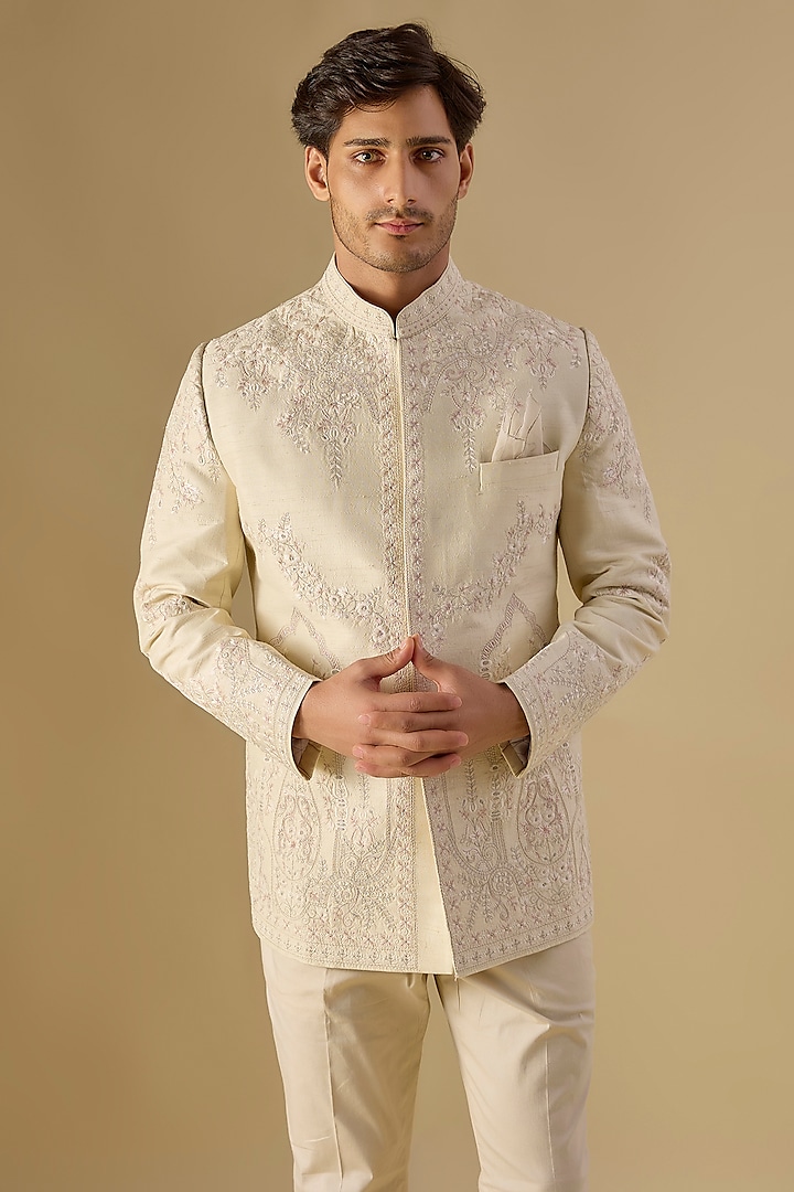 Ivory Raw Silk Embroidered Groom Bandhgala Set by Anushree Reddy Men at Pernia's Pop Up Shop