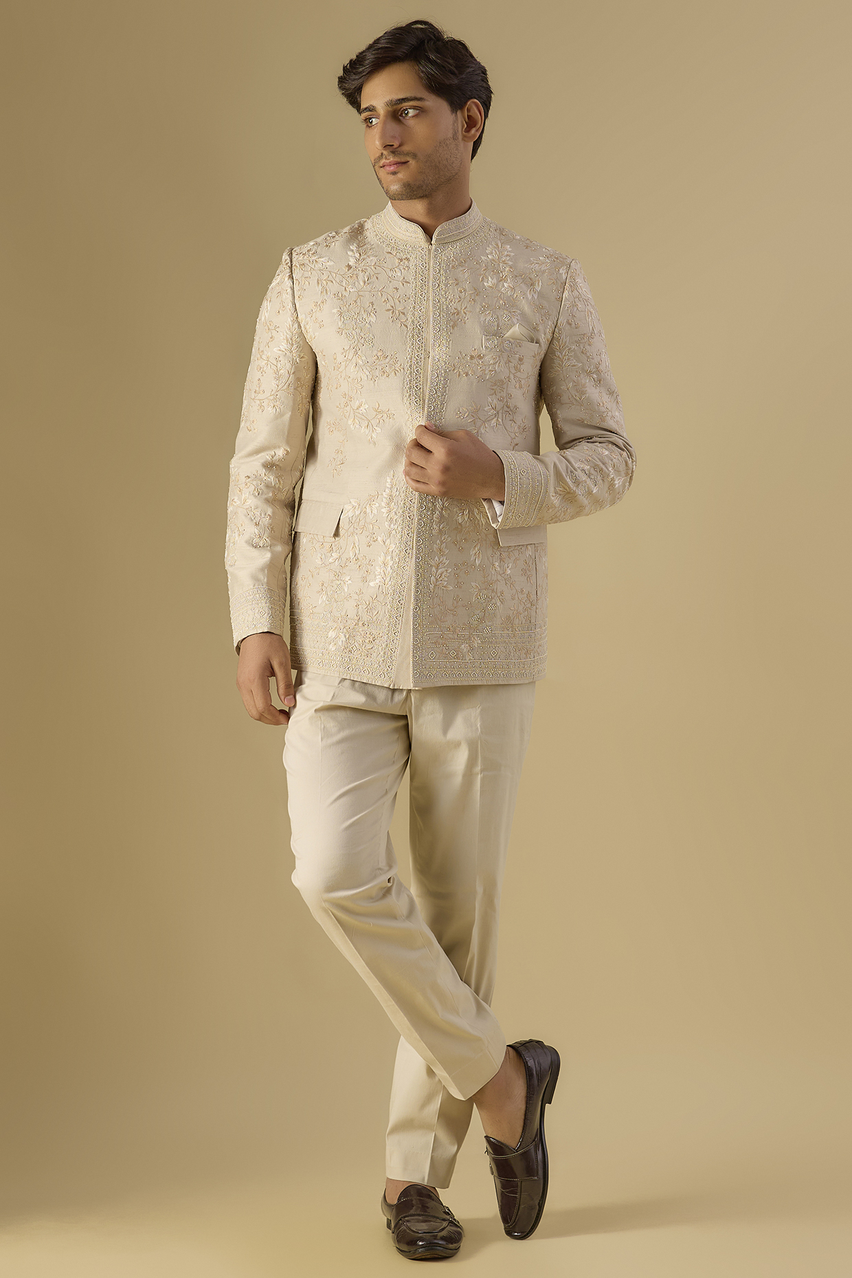 Dull Ivory Raw Silk Embroidered Bandhgala Set by Anushree Reddy Men