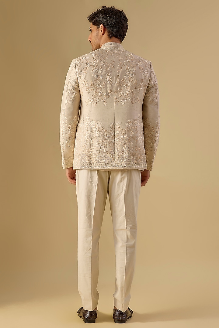 Dull Ivory Raw Silk Embroidered Groom Bandhgala Set by Anushree Reddy Men at Pernia's Pop Up Shop