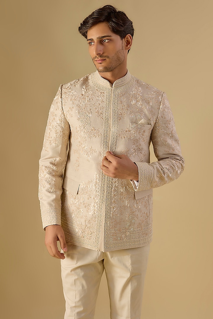 Dull Ivory Raw Silk Embroidered Groom Bandhgala Set by Anushree Reddy Men at Pernia's Pop Up Shop