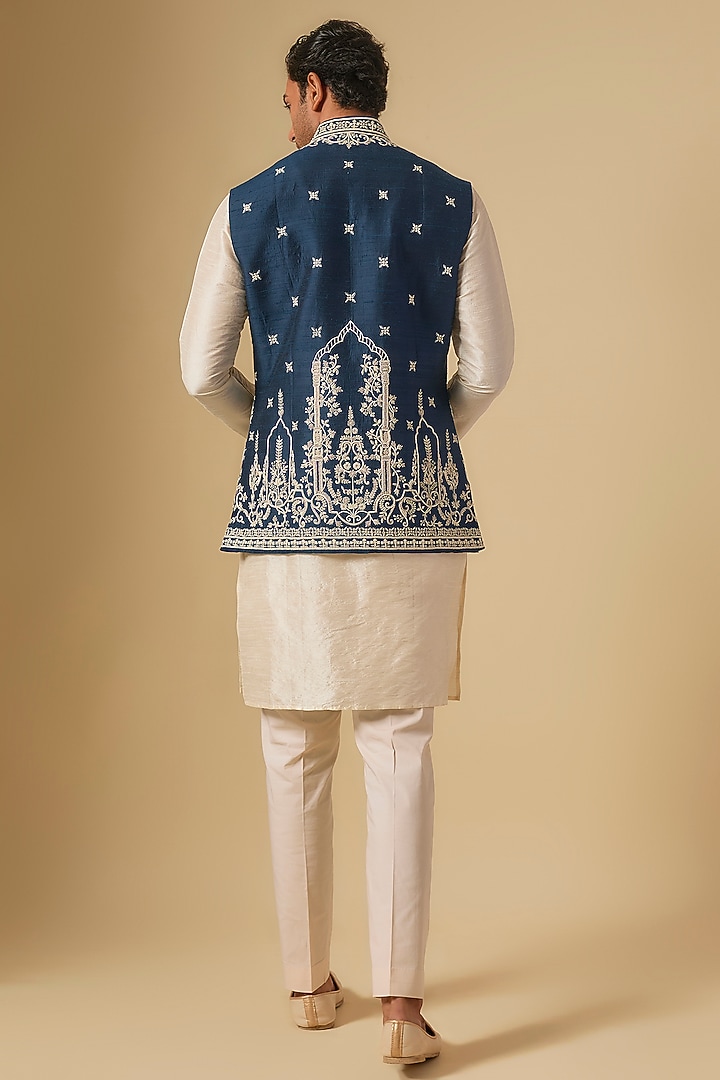 Midnight Blue & Ivory Raw Silk Embroidered Bundi Jacket by Anushree Reddy Men at Pernia's Pop Up Shop