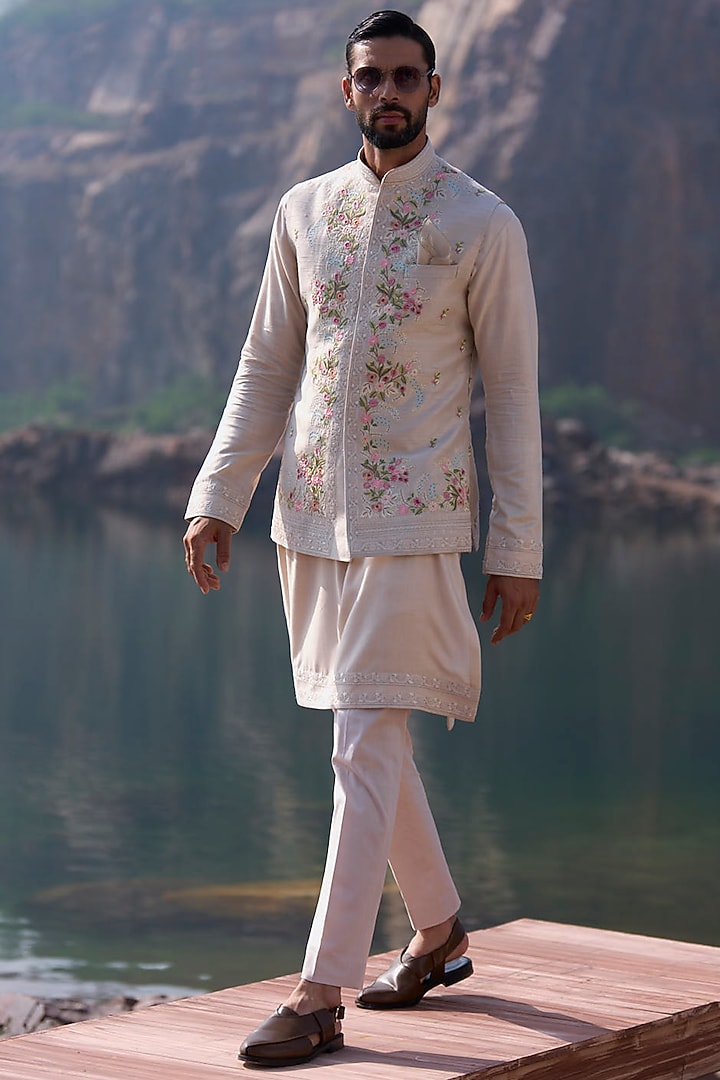 Ivory Raw Silk Thread Embroidered Bundi Jacket Set by Anushree Reddy Men at Pernia's Pop Up Shop