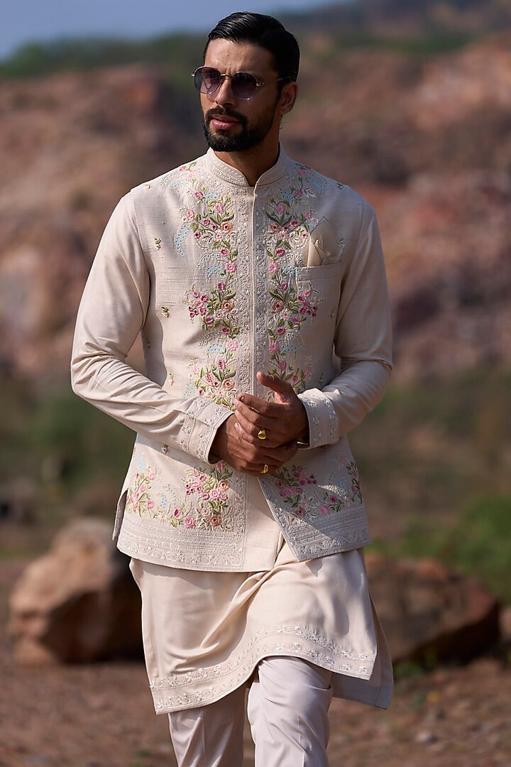 Ivory Raw Silk Thread Embroidered Bundi Jacket Set by Anushree Reddy Men at Pernia's Pop Up Shop