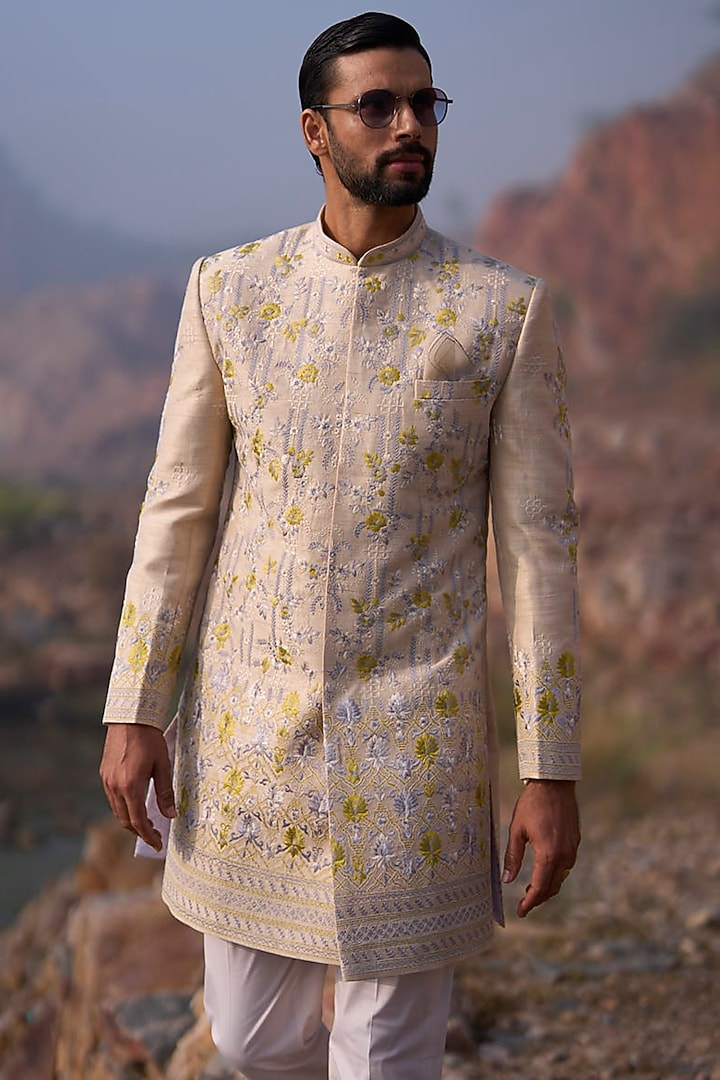 Dull Ivory Raw Silk Thread Embroidered Groom Sherwani Set by Anushree Reddy Men at Pernia's Pop Up Shop