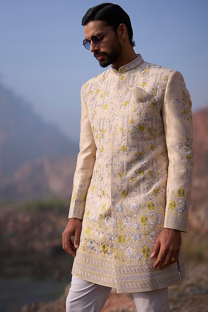 Dull Ivory Raw Silk Thread Embroidered Groom Sherwani Set by Anushree Reddy Men at Pernia's Pop Up Shop