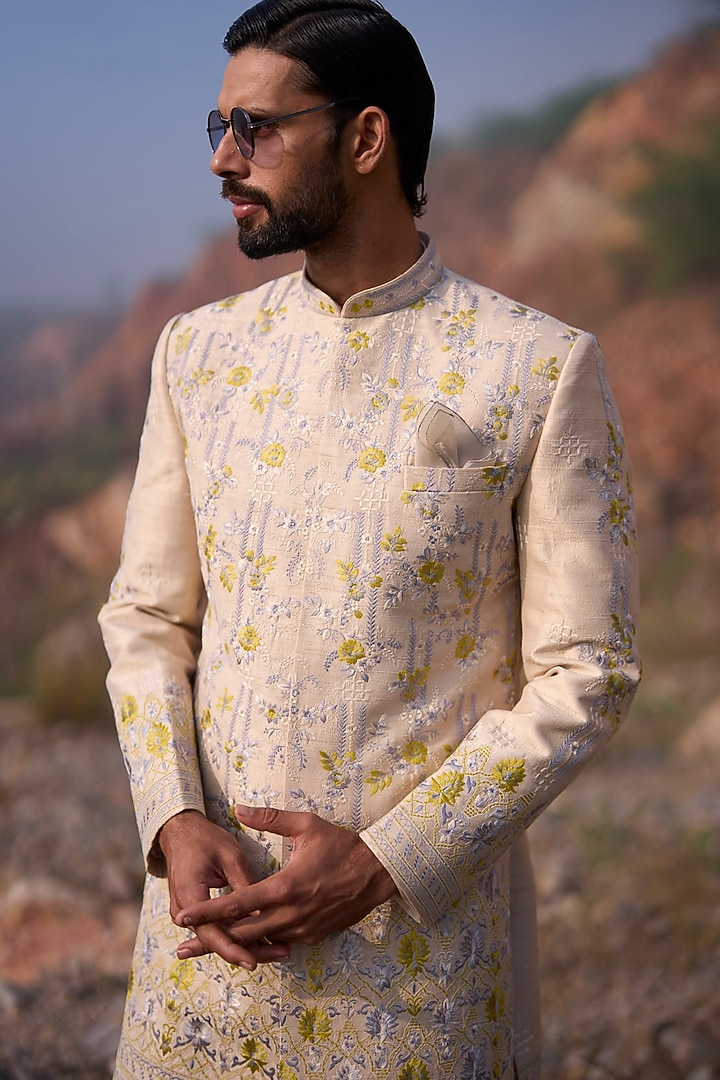 Dull Ivory Raw Silk Thread Embroidered Groom Sherwani Set by Anushree Reddy Men at Pernia's Pop Up Shop