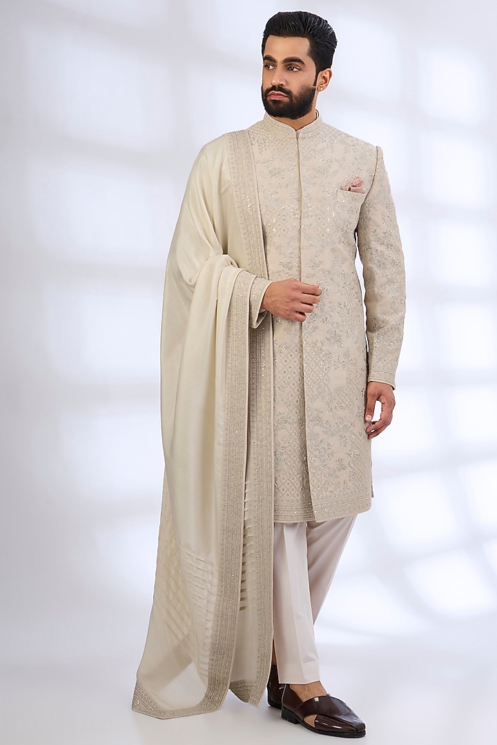 Dull Ivory Raw Silk Groom Sherwani Set by Anushree Reddy Men at Pernia's Pop Up Shop