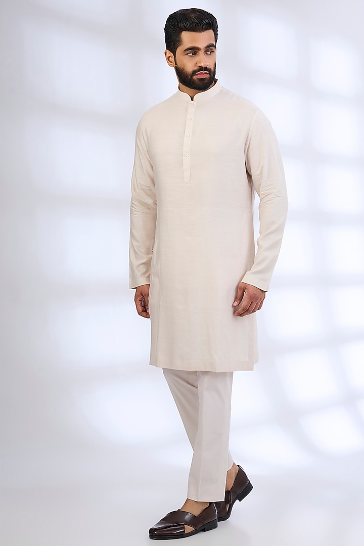 Dull Ivory Raw Silk Groom Sherwani Set by Anushree Reddy Men at Pernia's Pop Up Shop