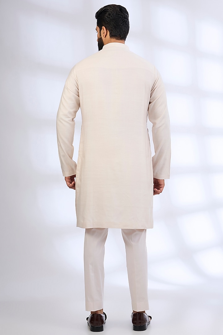 Dull Ivory Raw Silk Groom Sherwani Set by Anushree Reddy Men at Pernia's Pop Up Shop