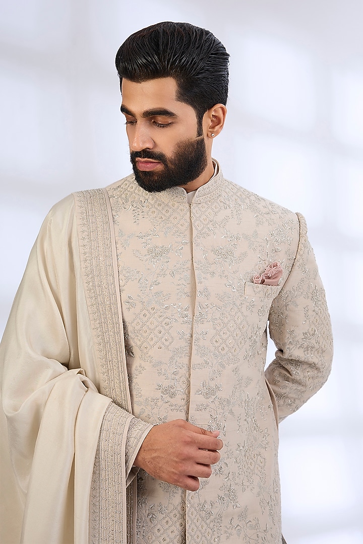 Dull Ivory Raw Silk Groom Sherwani Set by Anushree Reddy Men at Pernia's Pop Up Shop
