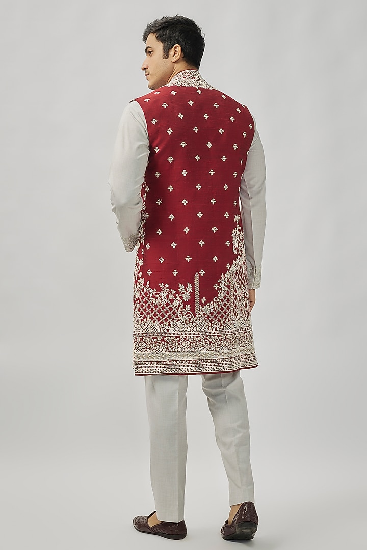 Cherry Red Raw Silk Groom Indowestern Set by Anushree Reddy Men at Pernia's Pop Up Shop