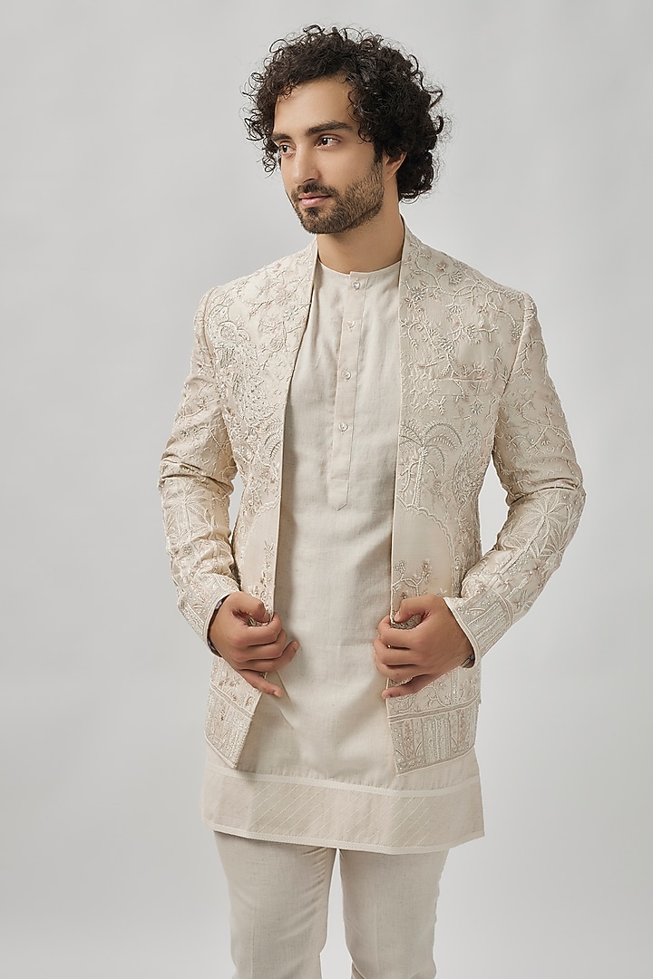 Ivory Raw Silk Groom Indowestern Set by Anushree Reddy Men at Pernia's Pop Up Shop