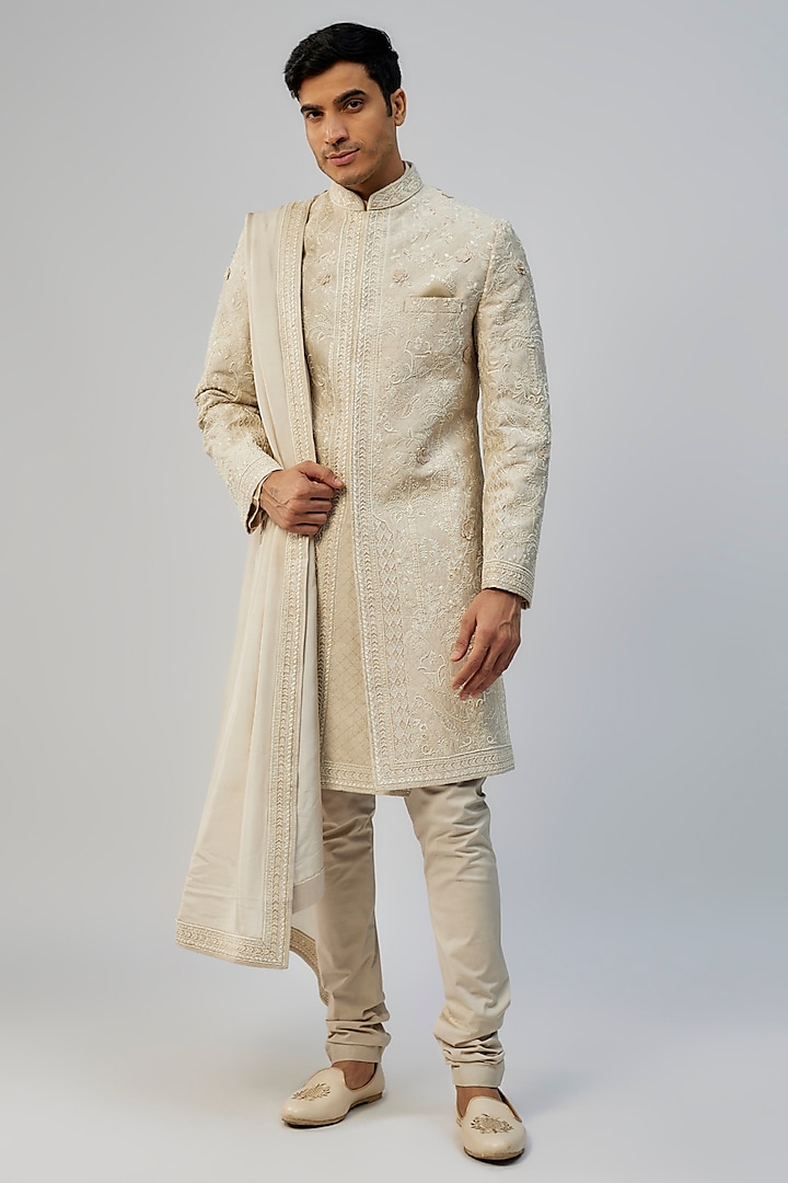 Ivory Raw Silk Embroidered Sherwani Set by Anushree Reddy Men