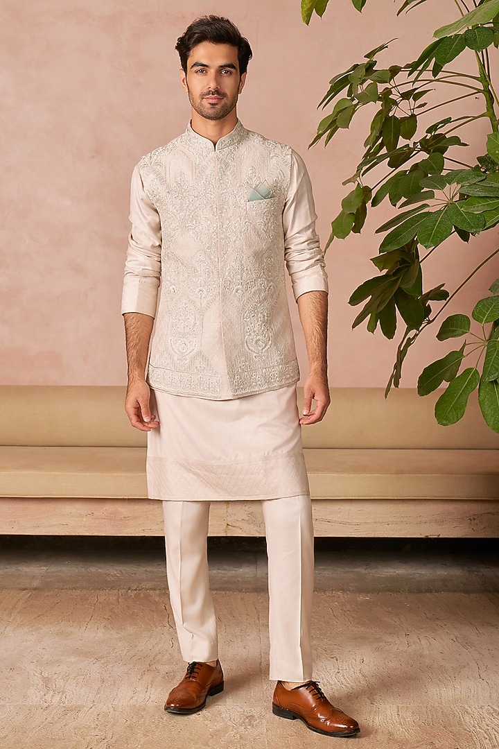 Ivory Raw Silk Bundi Jacket Set by Anushree Reddy Men at Pernia's Pop Up Shop
