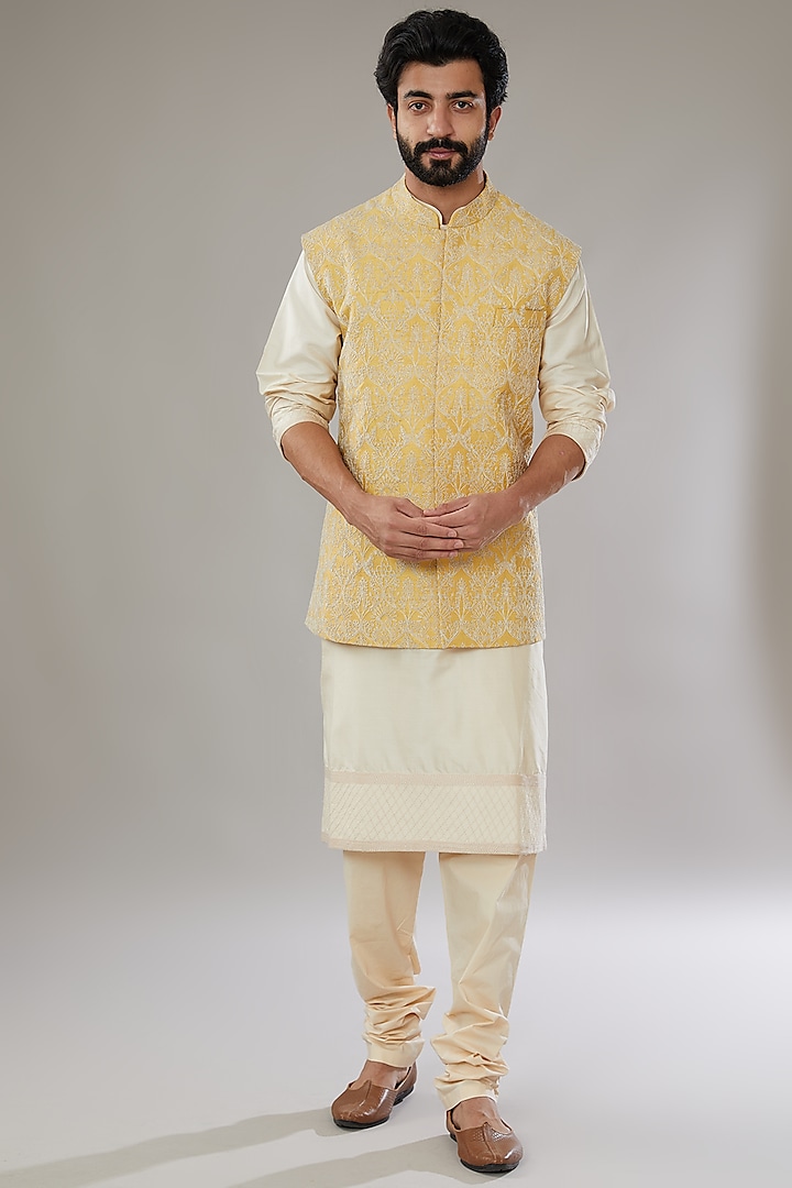 Pastel Yellow Raw Silk Embroidered Bundi Jacket Set by Anushree Reddy Men